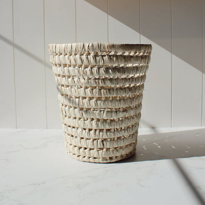 Round palm leaf basket