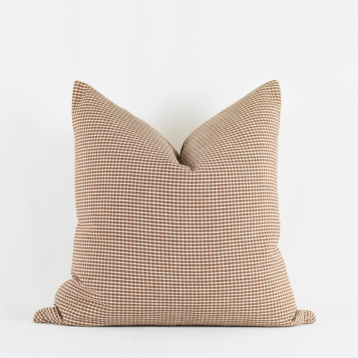 George Rust Pillow twenty by twenty, has rust and white small checkers throughout